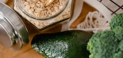 A close-up of oats, avocado, and broccoli in eco-friendly packaging, promoting a no plastic lifestyle.